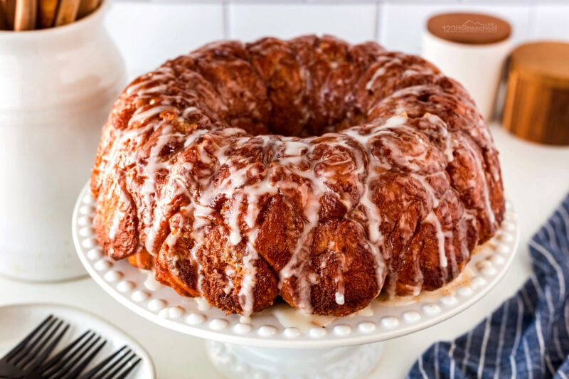 One of our families favorite traditions for Christmas morning is our homemade monkey bread recipe. We use to make it with convenient instant biscuits in a can, but as we became more aware of all of the junk, harmful preservatives and chemicals we knew we needed to make monkey bread from scratch! So after lots of experimenting we came up with the best monkey bread recipe! You'll love the fabulous old fashioned monkey bread recipe flavor with the beautiful pull apart breakfast bread with a sticky, sweet covering.